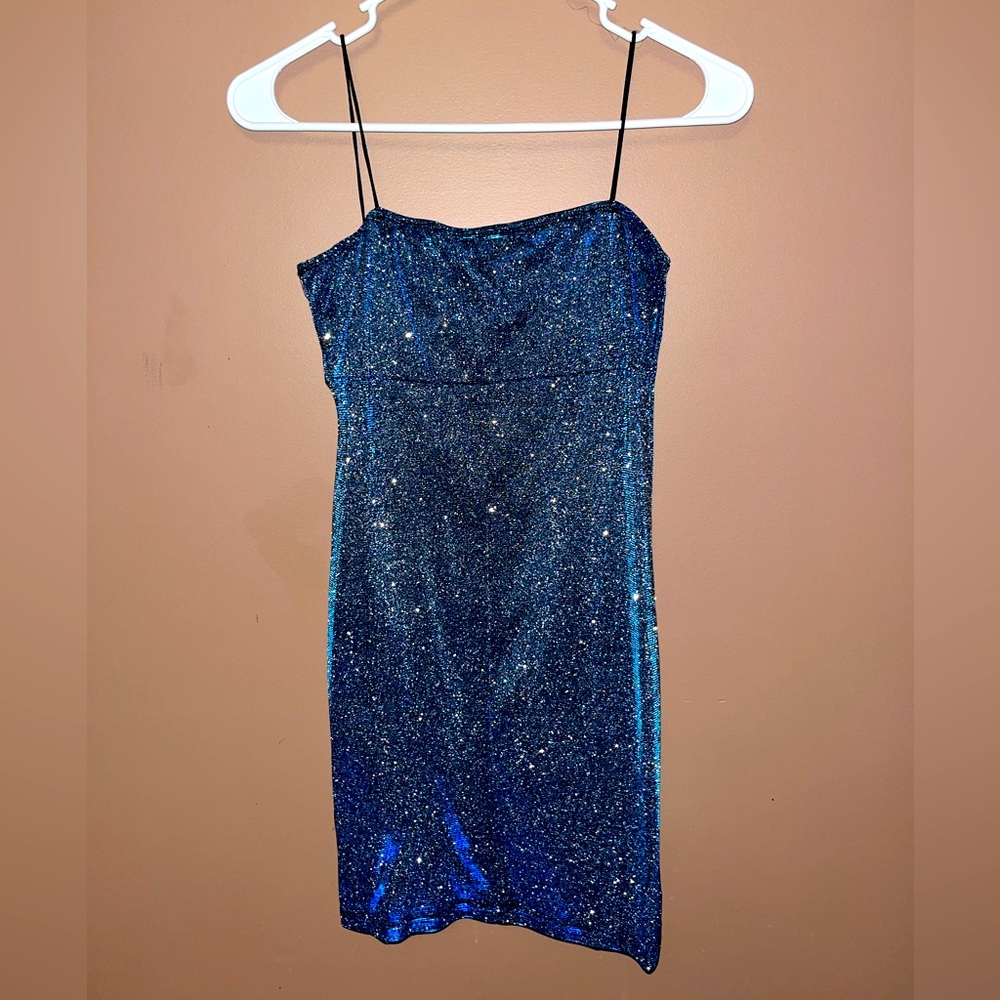 Blue glitter bodycon dress.